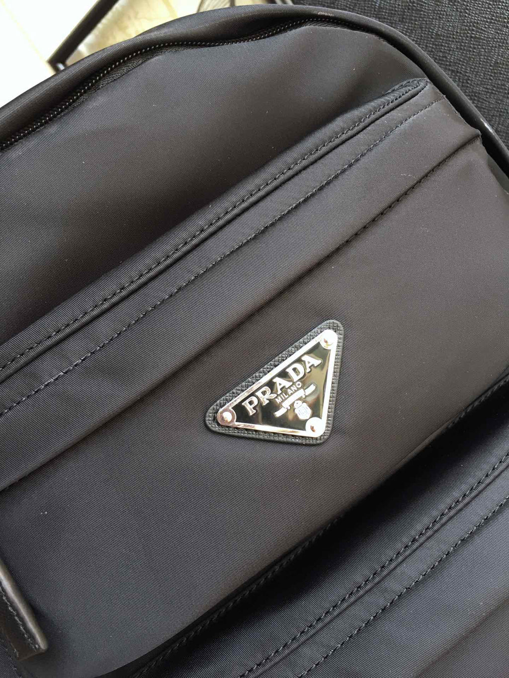 PRADA TRIANGLE LOGO BACKPACK 40 IN BLACK RE-NYLON