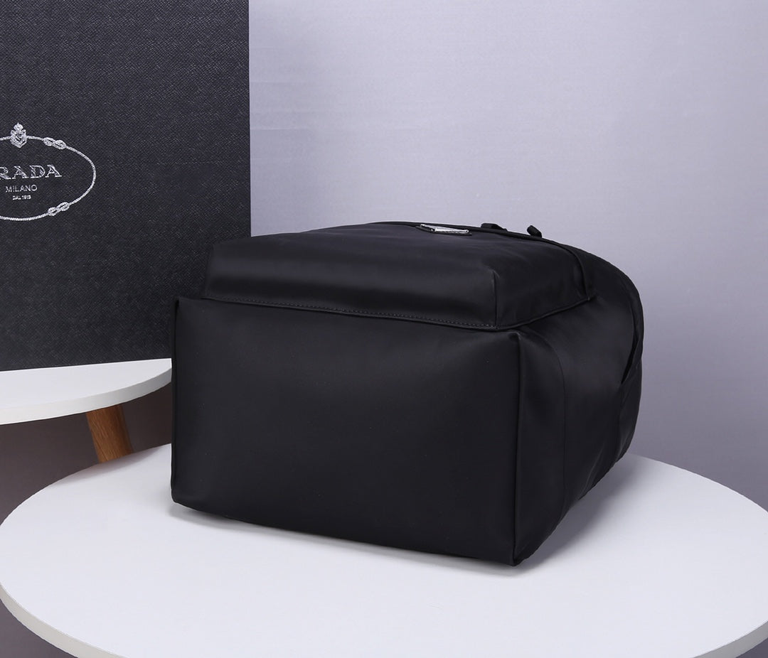 PRADA BACKPACK 39 IN BLACK RE-NYLON AND SAFFIANO LEATHER