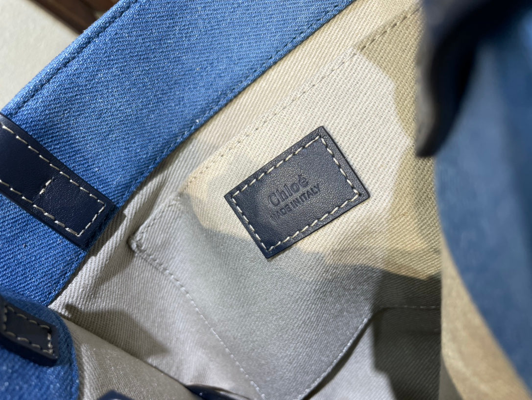 SMALL STRAP WOODY TOTE BAG 26.5 IN BLUE DENIM CANVAS DARK BLUE CALFSKIN