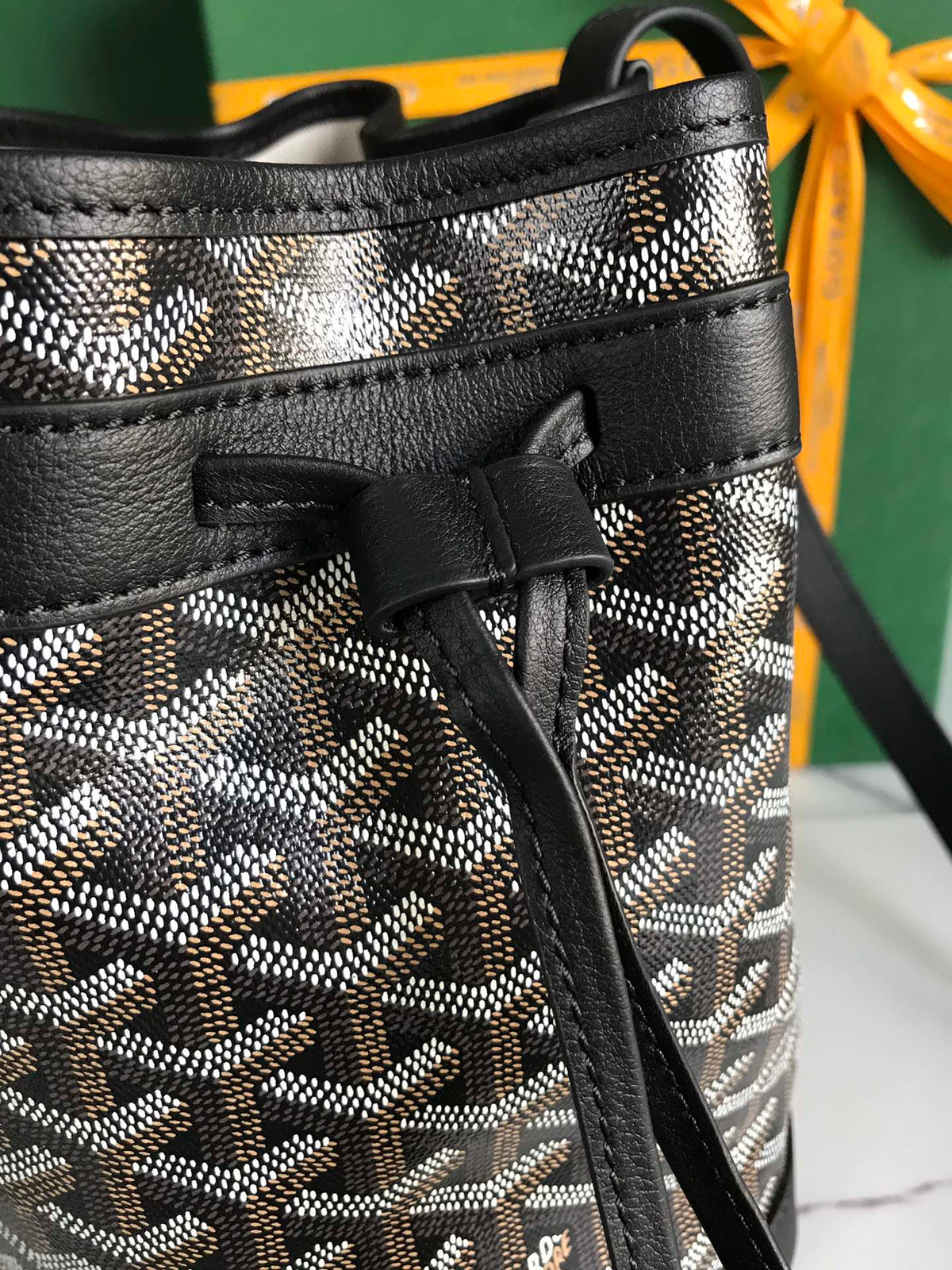 PETIT FLOT BUCKET BAG 22 IN BLACK GOYARDINE CANVAS AND LAMBSKIN TRIM