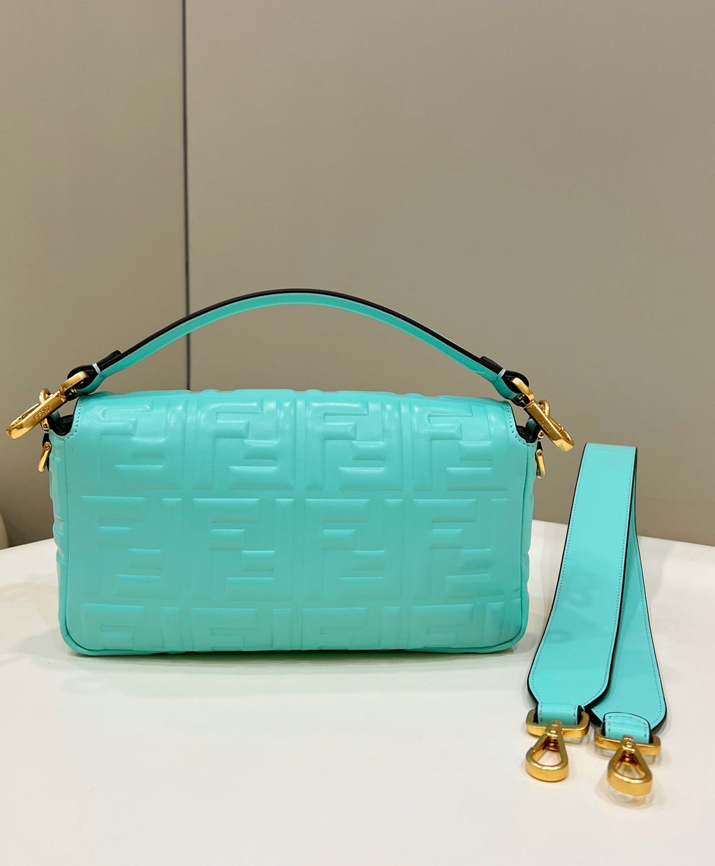 BAGUETTE WITH FF MOTIF 27 IN TURQUOISE SOFT LAMBSKIN GOLD HARDWARE