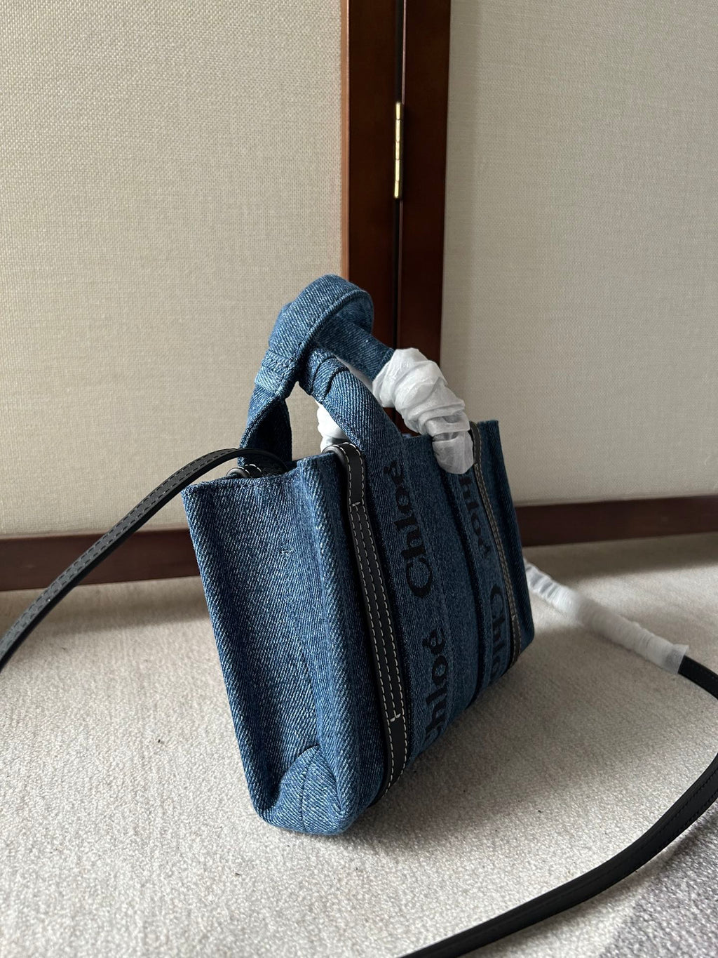 MINI WOODY TOTE BAG 20 IN BLUE DENIM BLACK CALFSKIN