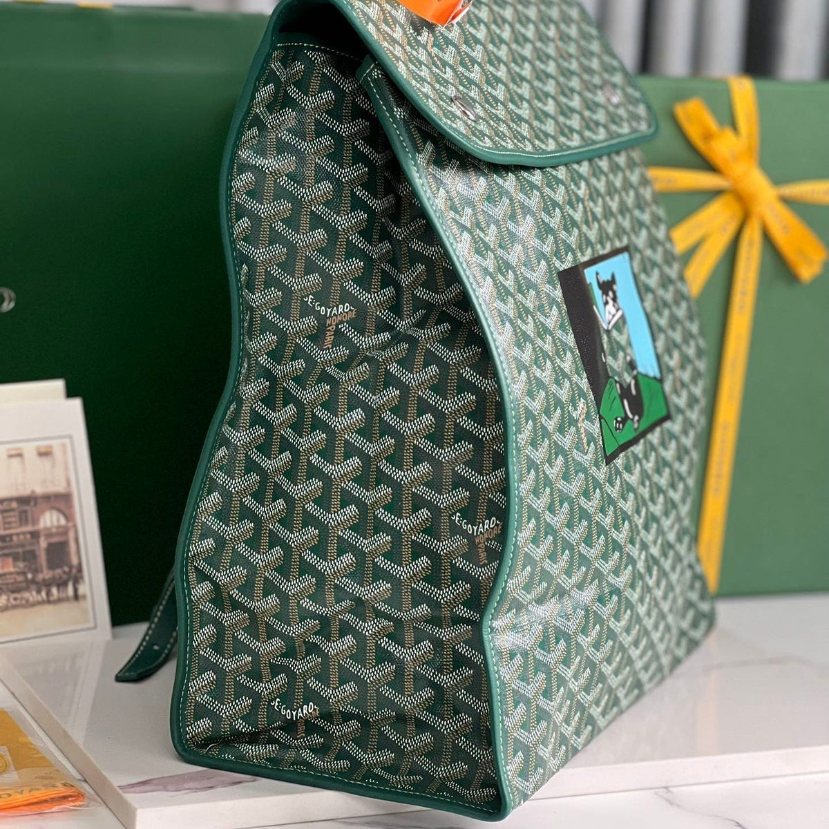 SAINT LÉGER BACKPACK 35 IN GREEN GOYARDINE CANVAS AND CALFSKIN WITH CARTOON PATCH
