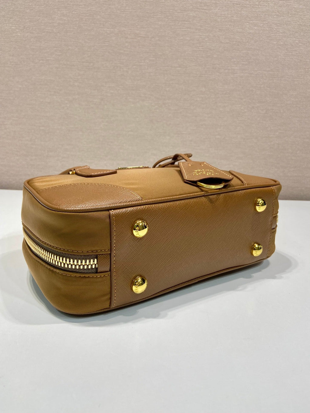 PRADA SMALL TOP HANDLE BAG 25 IN GOLDEN BROWN NYLON AND CALFSKIN TRIM