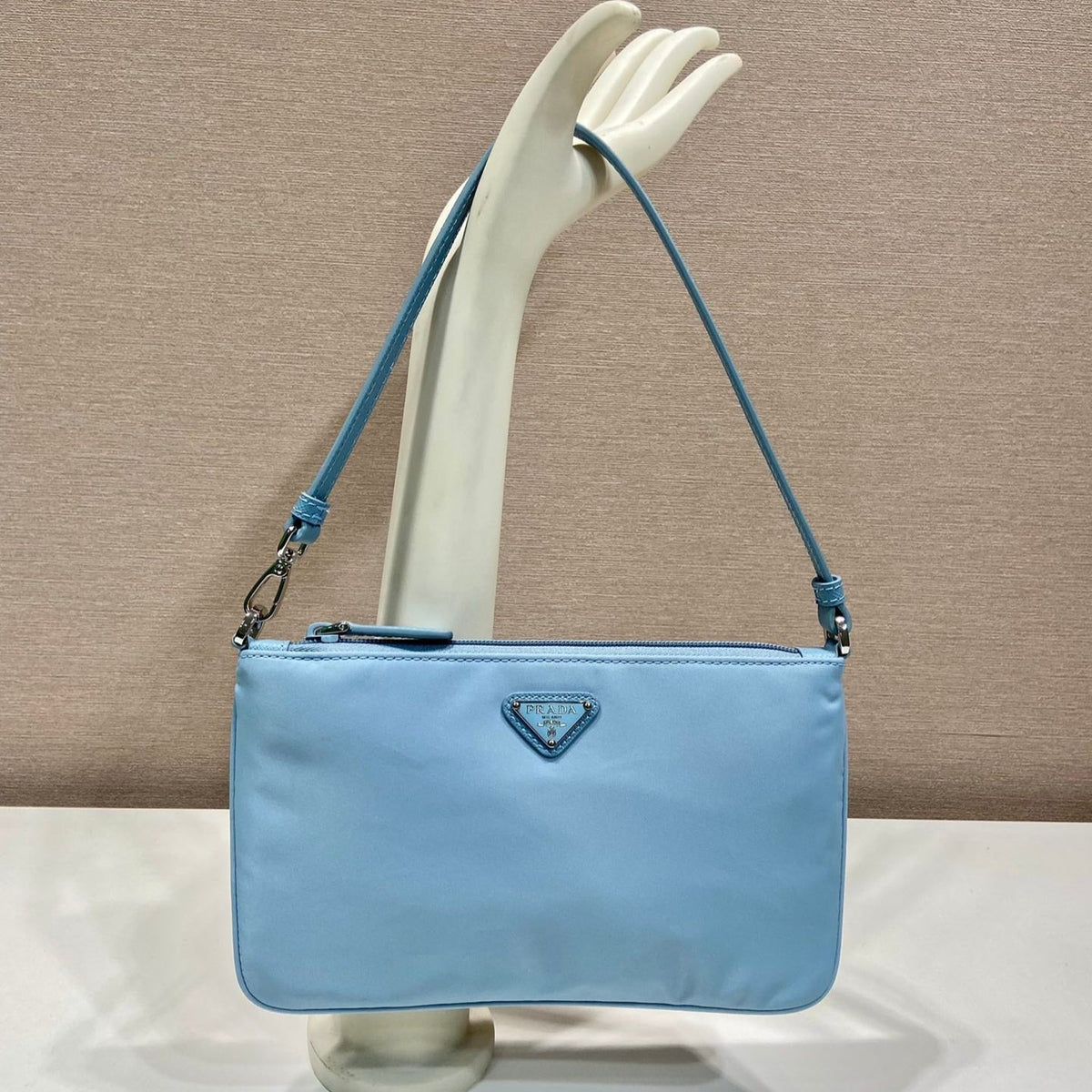 PRADA SHOULDER BAG 24 WITH TRIANGLE LOGO IN SKY BLUE RE-NYLON FABRIC