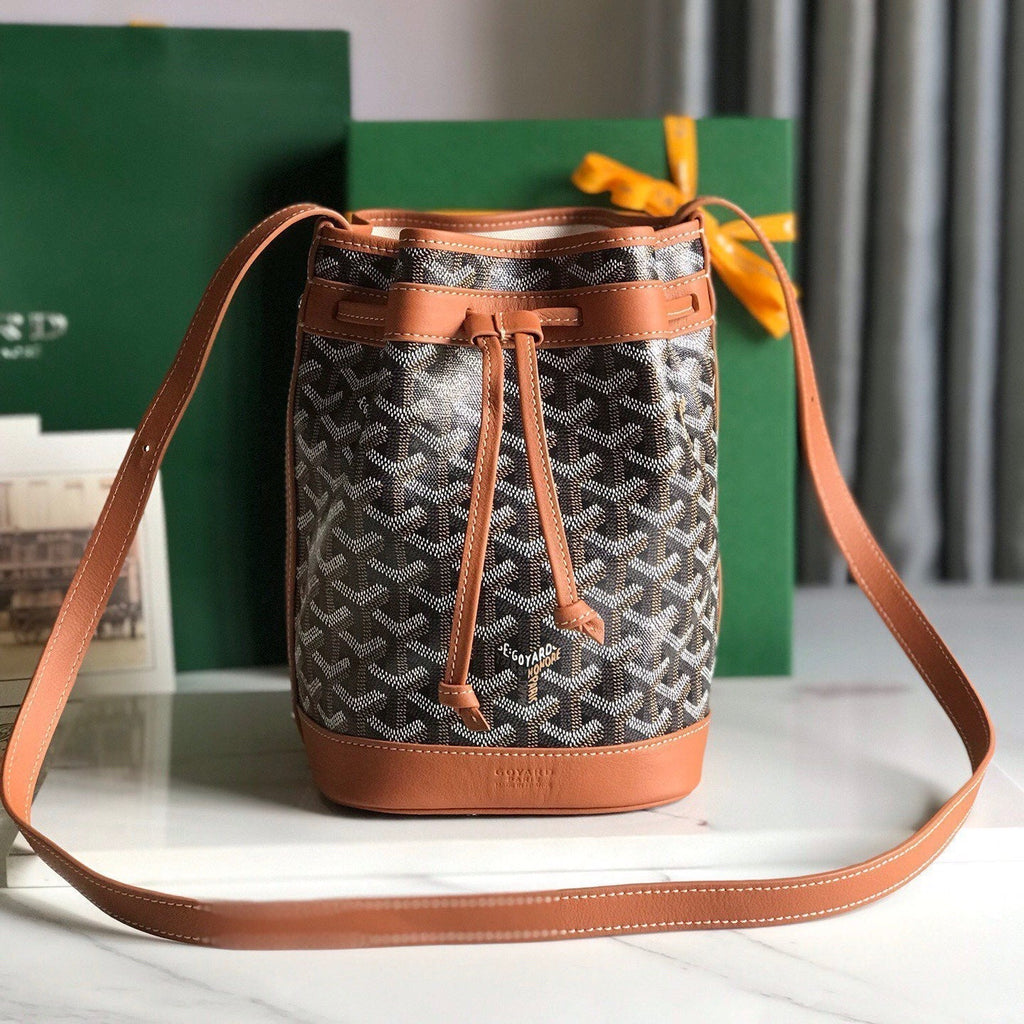 PETIT FLOT BUCKET BAG 22 IN BLACK GOYARDINE CANVAS AND TAN LAMBSKIN TRIM
