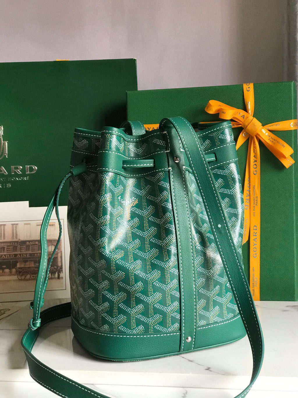 PETIT FLOT BUCKET BAG 22 IN GREEN GOYARDINE CANVAS AND LAMBSKIN TRIM