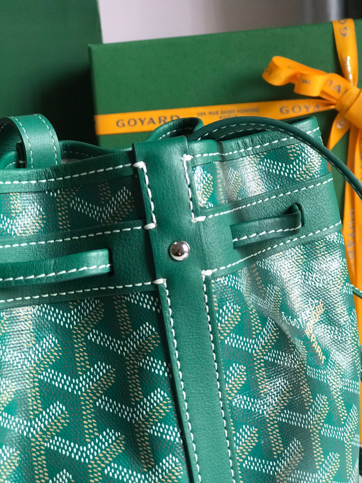 PETIT FLOT BUCKET BAG 22 IN GREEN GOYARDINE CANVAS AND LAMBSKIN TRIM