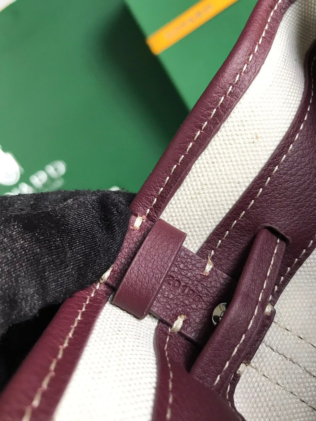 PETIT FLOT BUCKET BAG 22 IN WINE RED GOYARDINE CANVAS AND LAMBSKIN TRIM