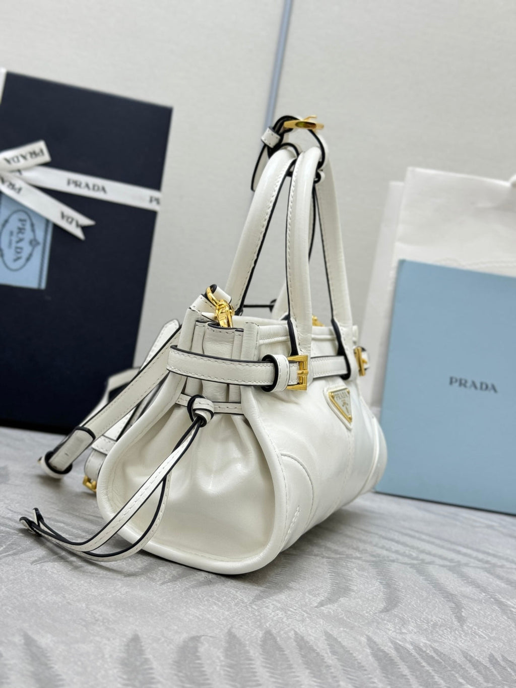 PRADA 25S BONNIE MINI HANDBAG 23 IN WHITE CALFSKIN GOLD HARDWRE