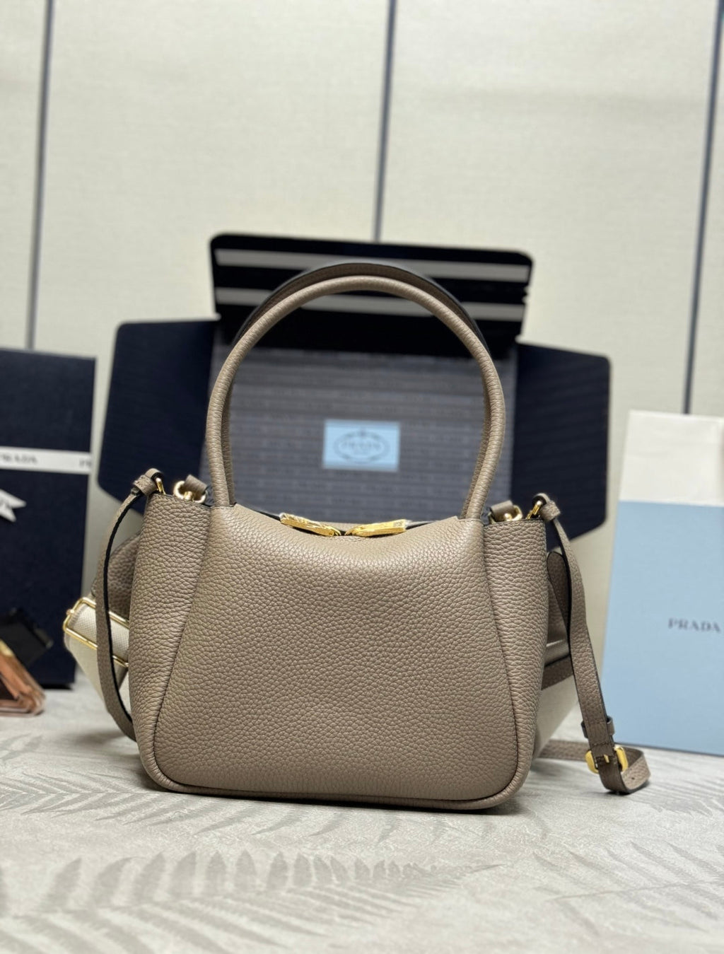 PRADA 25S SMALL BAG 23 IN TAUPE CALFSKIN GOLD HARDWARE