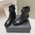 CHANEL 25S ANKLE BOOTS IN BLACK CALFSKIN GLOSSY TOE RUCHED