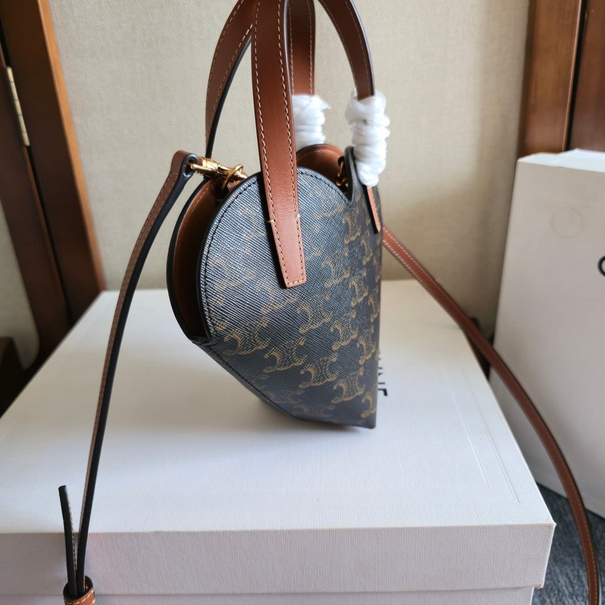CELINE 25S TEEN COEUR BAG 19 MM IN BLACK TRIOMPHE CANVAS AND TAN CALFSKIN