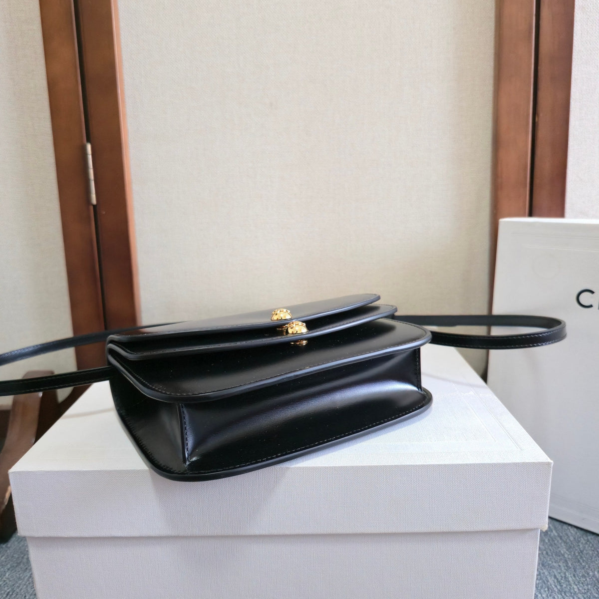 CELINE 25S DUO WALLET ON STRAP 20MM IN BLACK SHINY CALFSKIN