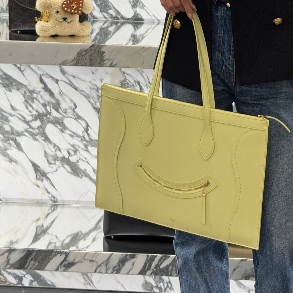 CELINE 25S FLAT CABAS NEW LUGGAGE 44MM IN PASTEL YELLOW GLOSSY CALFSKIN