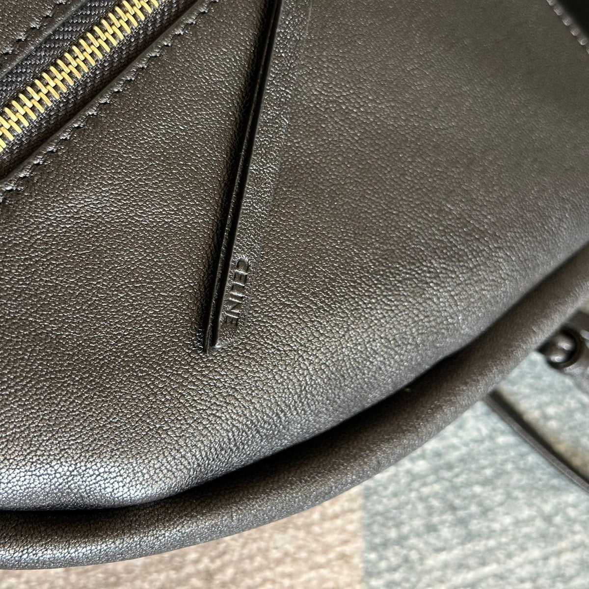 CELINE 25S HALFMOON SOFT TRIOMPHE BAG 46MM IN BLACK SUPPLE SHINY LAMBSKIN