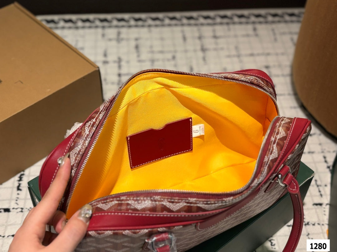 SAINT MARTIN BAG 35 IN BURGUNDY RED GOYARDINE CANVAS AND CALFSKIN