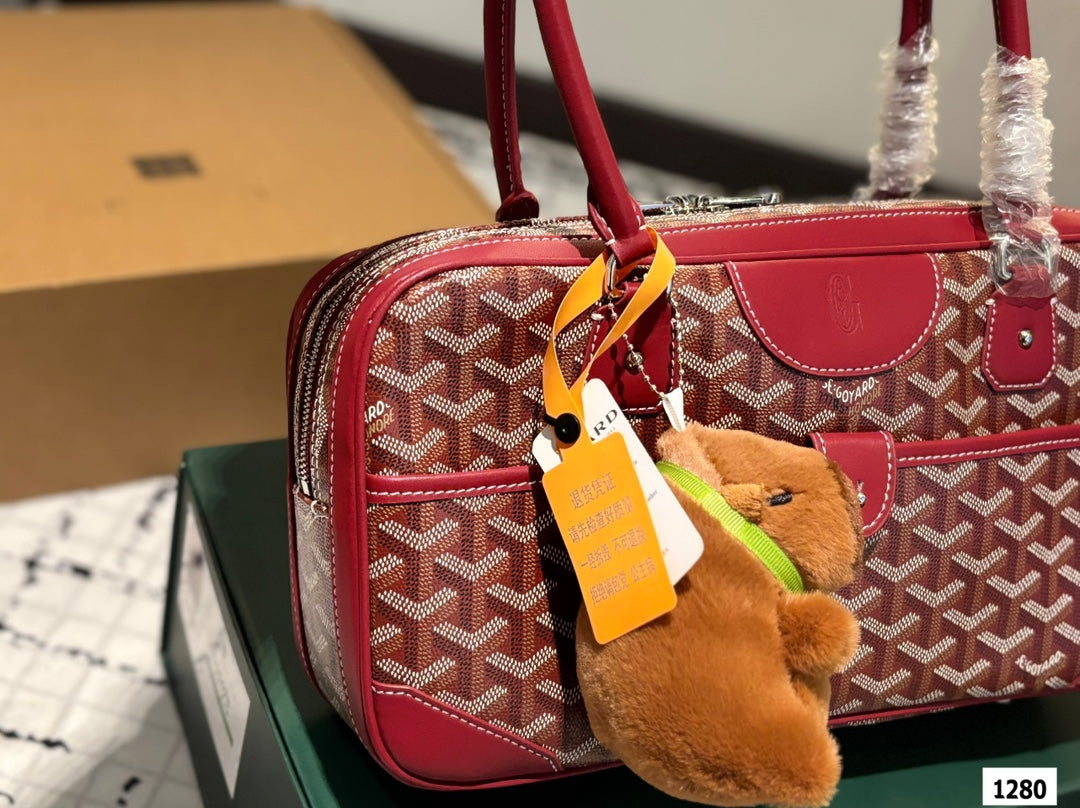 SAINT MARTIN BAG 35 IN BURGUNDY RED GOYARDINE CANVAS AND CALFSKIN