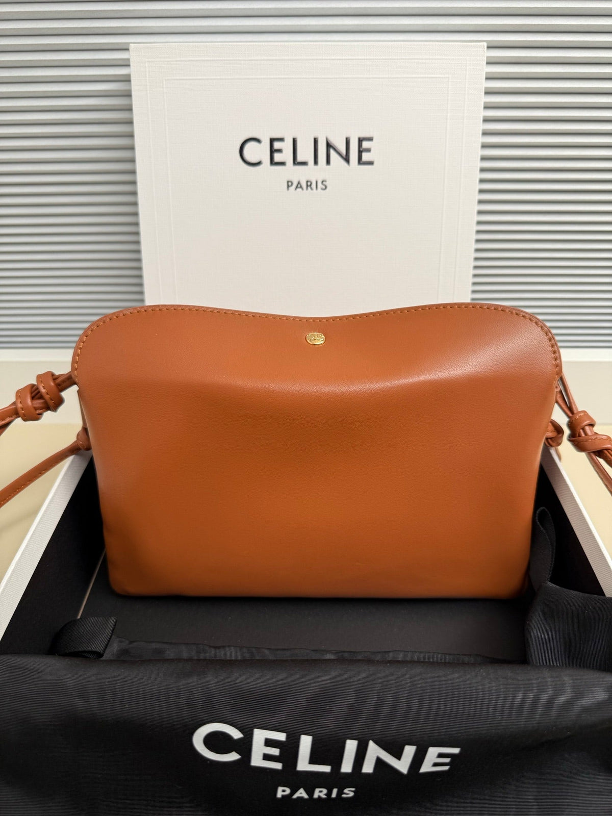 CELINE 25S TRIO FLAP 22MM IN BURNT ORANGE SMOOTH LAMBSKIN GOLD HARDWARE