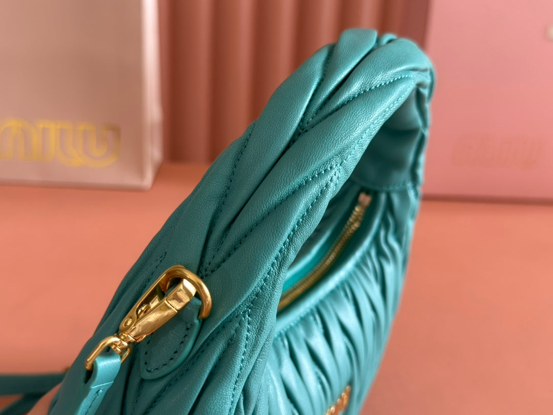 WANDER MATELASSÉ HANDBAG 23 IN LAGOON BLUE LAMBSKIN