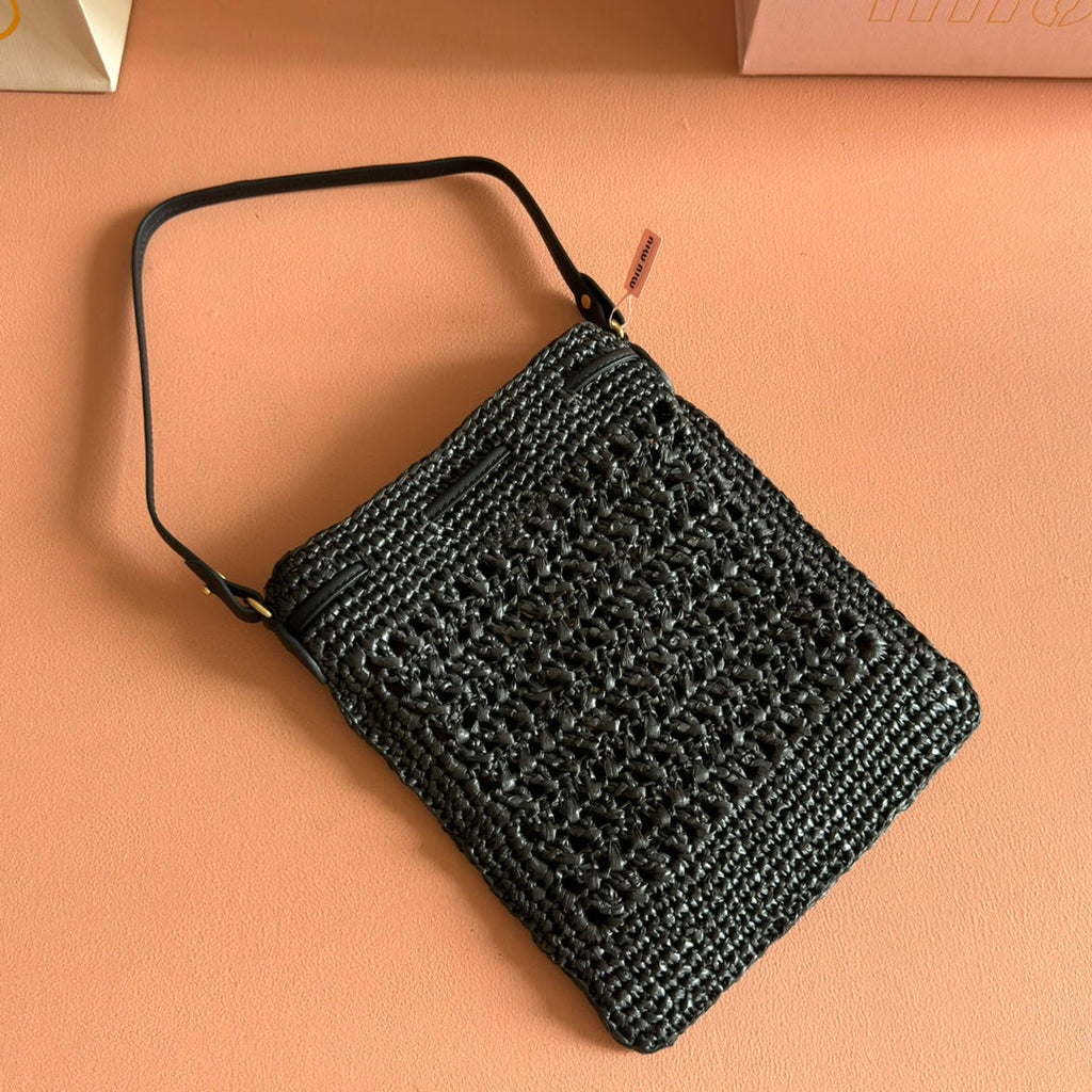 WANDER BUCKET BAG 23 BLACK IN RAFFIA WITH LEATHER TRIM