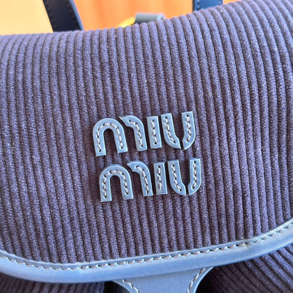 MIUMIU 26S MEDIUM BACKPACK 29 IN DARK BLUE CANVAS BLUE CALFSKIN