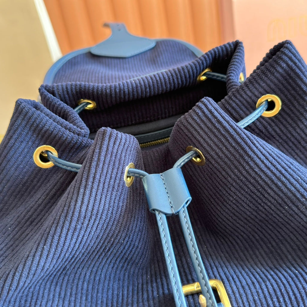 MIUMIU 26S MEDIUM BACKPACK 29 IN DARK BLUE CANVAS BLUE CALFSKIN