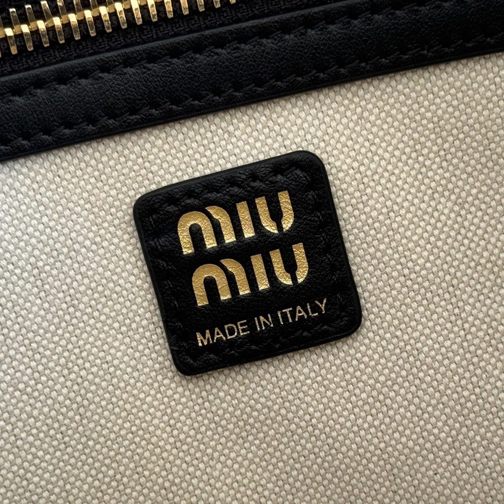 MIUMIU 26S POCKET TOP-HANDLE BAG 32 IN BLACK CALFSKIN GOLD HARDWARE