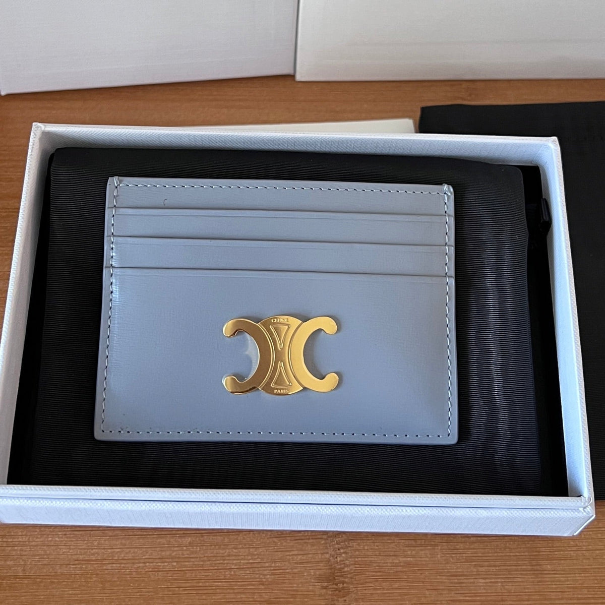 CELINE 25S CARD HOLDER WITH TRIOMPHE LOGO 11 IN LIGHT BLUE GRAY CALFSKIN