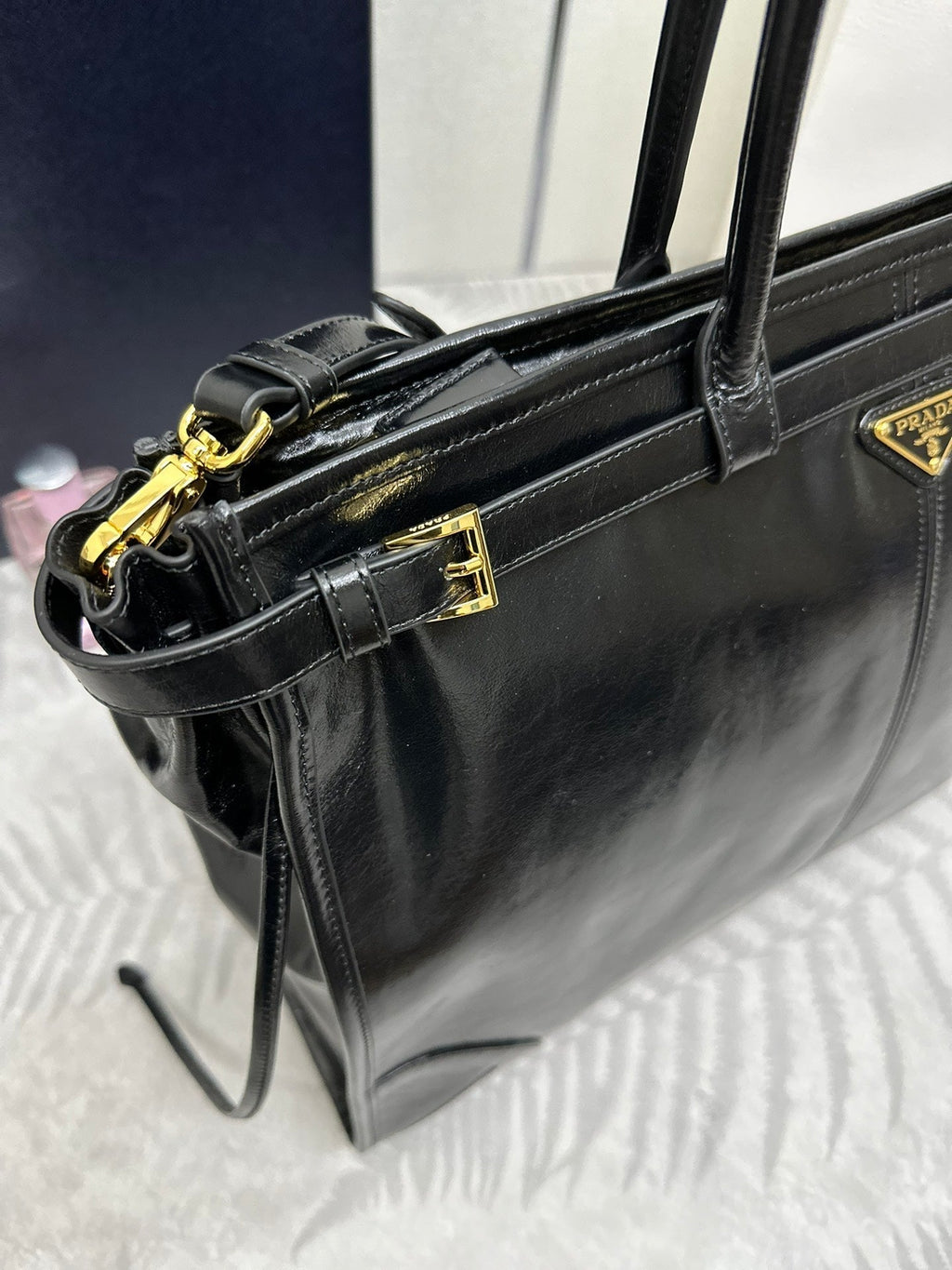 PRADA TOTE BAG WITH BELT 42 IN BLACK OIL WAX LAMBSKIN GOLD HARDWARE