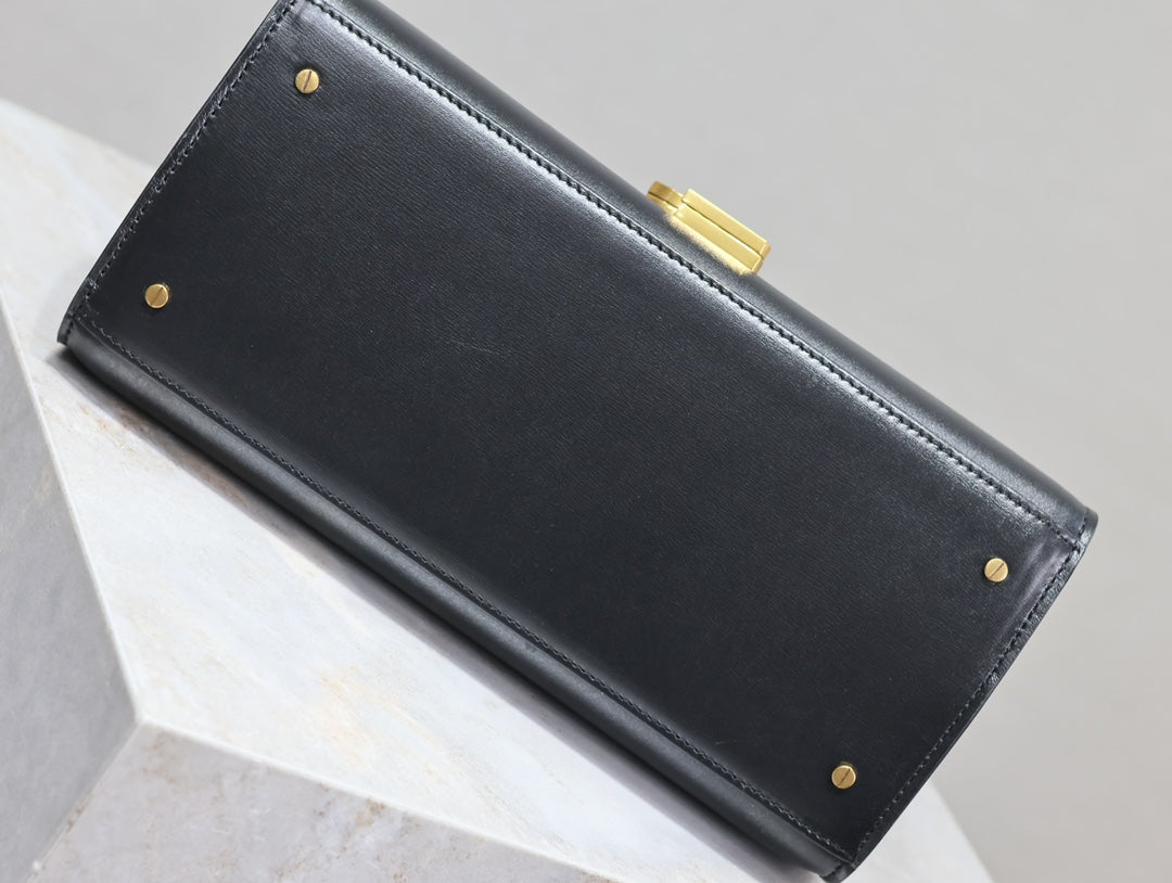 CASSANDRA TOP HANDLE BAG 24 IN BLACK SMOOTH LAMBSKIN GOLD HARDWARE