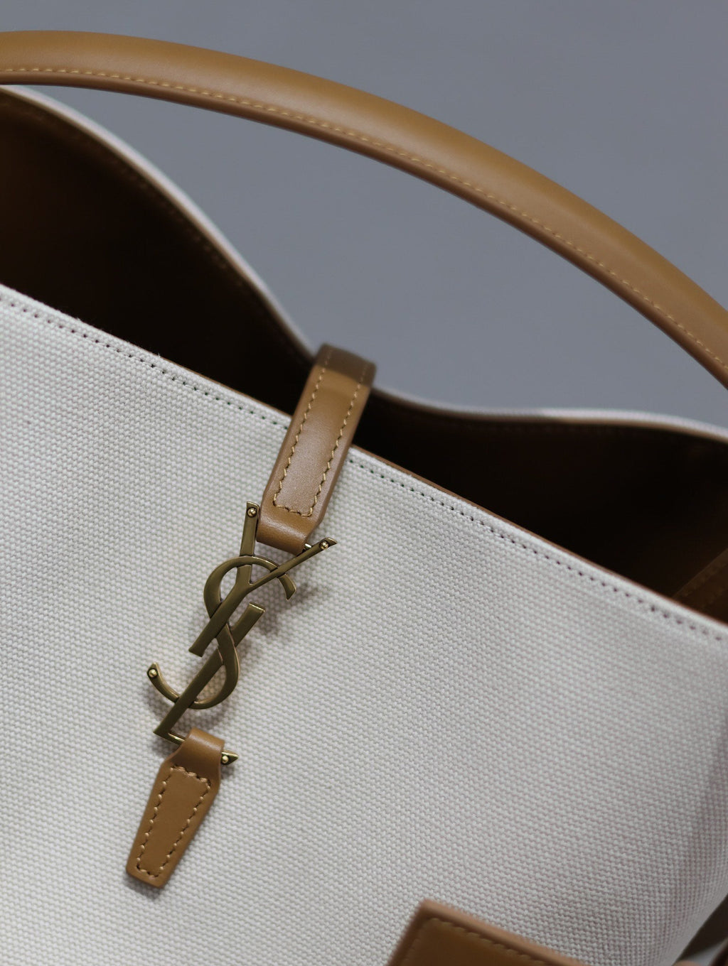 YSL 25S LE 5 À 7 BUCKET 26 IN CREAM BROWN CALFSKIN AND CANVAS GOLD HARDWRE