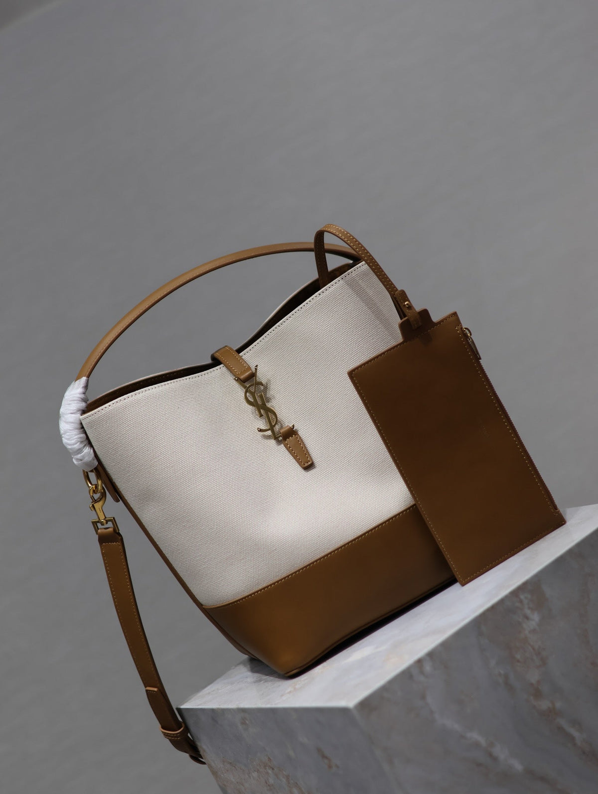 YSL 25S LE 5 À 7 BUCKET 26 IN CREAM BROWN CALFSKIN AND CANVAS GOLD HARDWARE