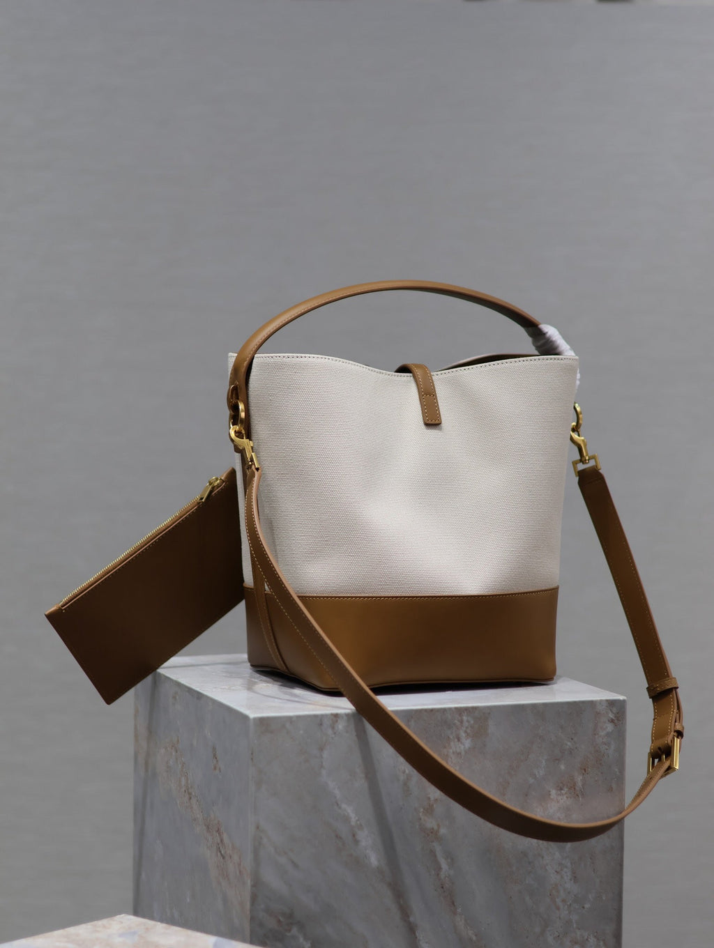 YSL 25S LE 5 À 7 BUCKET 26 IN CREAM BROWN CALFSKIN AND CANVAS GOLD HARDWRE