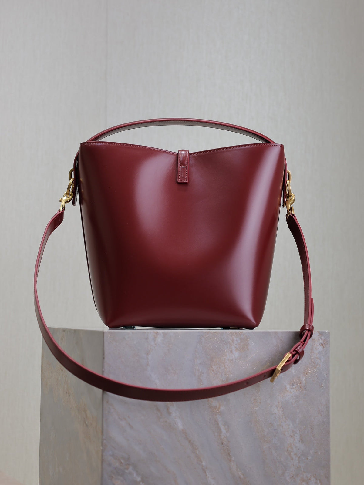 YSL 25S LE 5 À 7 BUCKET 26 IN DARK BURGUNDY CALFSKIN GOLD HARDWARE